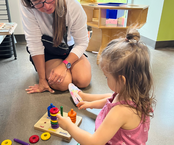 Photo of child playing at community play group.