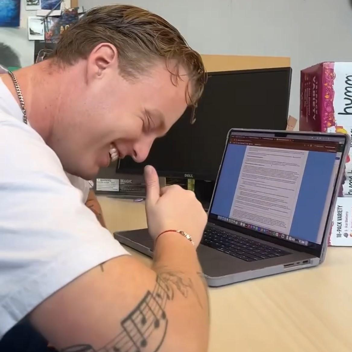 Nevan in front of computer