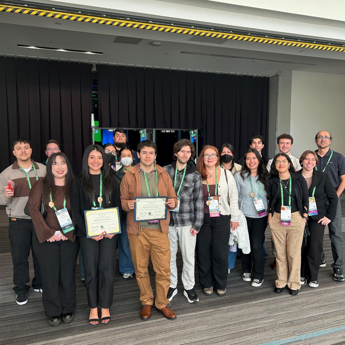 Group picture with winners at SACNAS.JPG