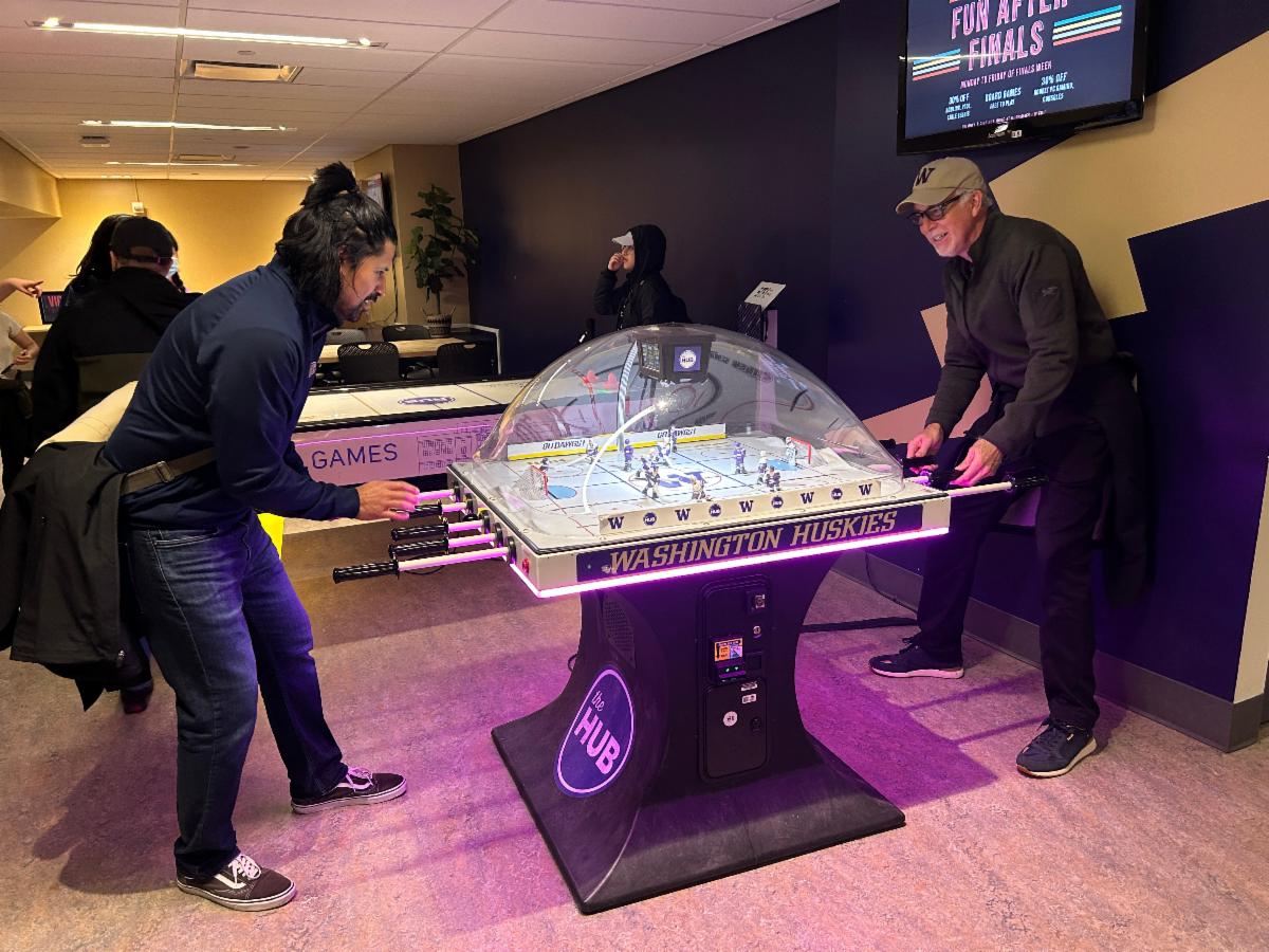 Eric and Buck playing table hockey