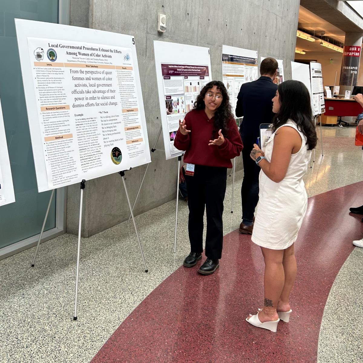 Moncerat talking to poster judge