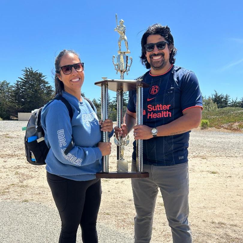 jessica and eric holding trophy