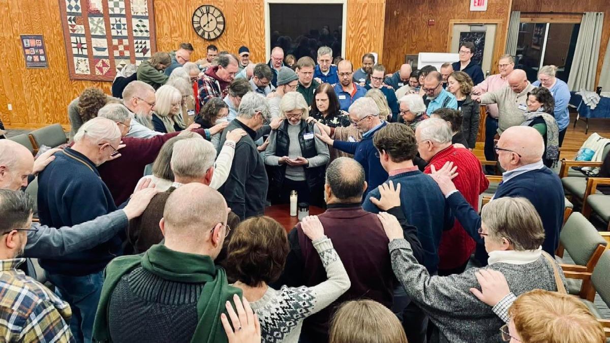 DSO clergy pray over then Bishop-Elect Kristin White at a clergy gathering.