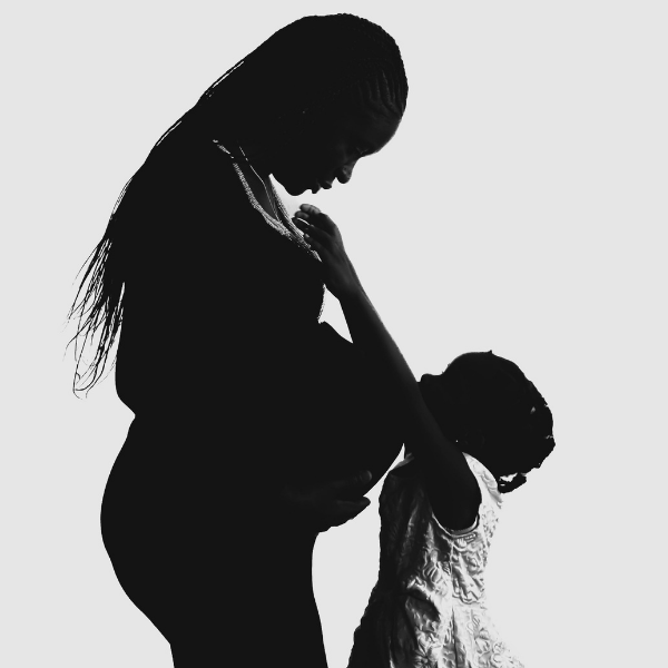 Photo of pregnant mother and child