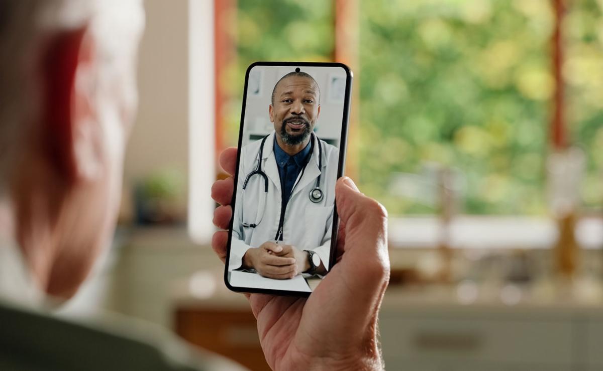 person talking to doctor via a video call on mobile