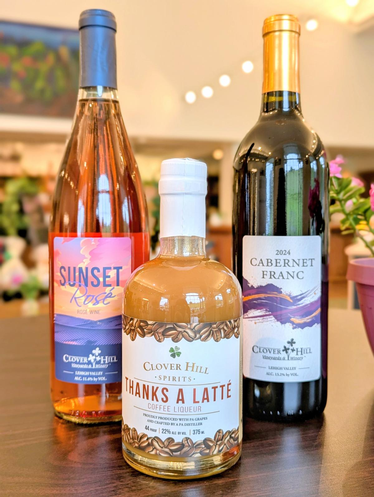 three bottles of new wine and spirits releases - a rose, a dry red and a coffee liqueur