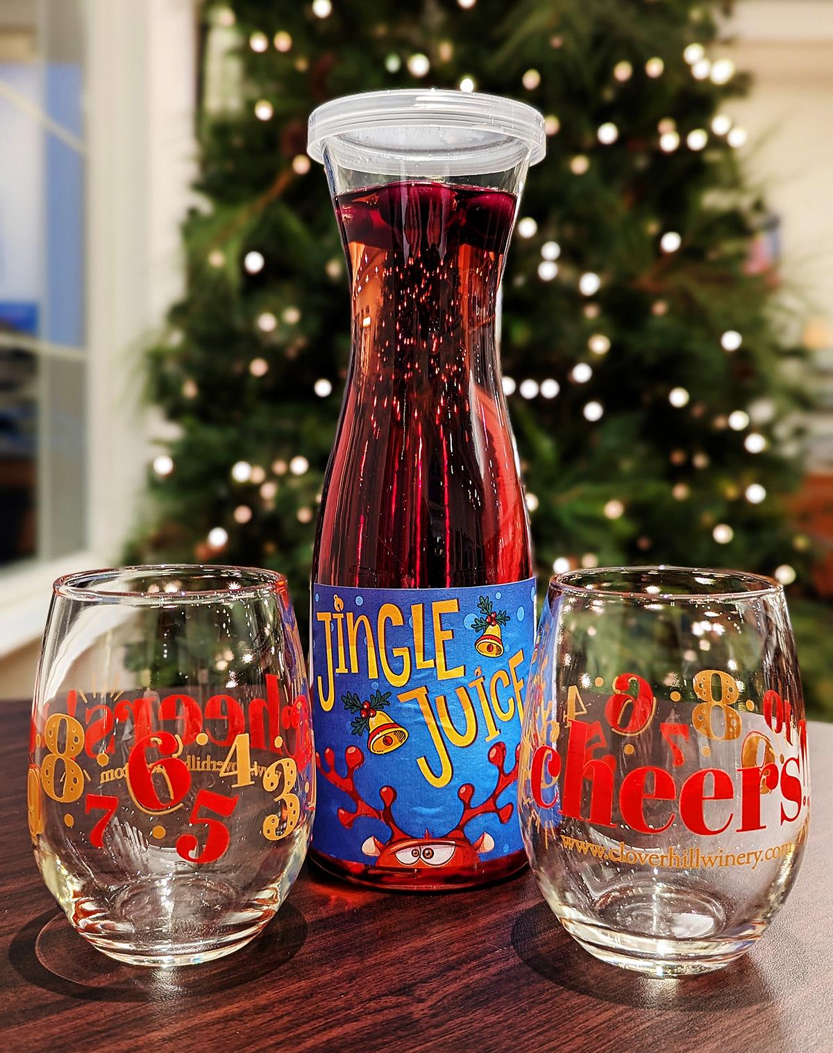 carafe of Jingle Juice sangria with 2 wine glasses