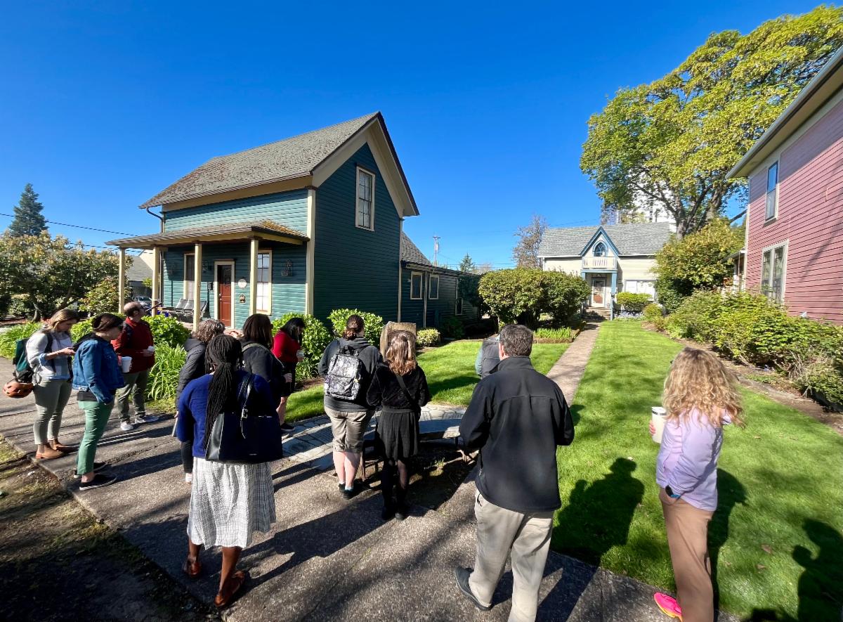 City of Eugene staff touring the historic Mims houses.