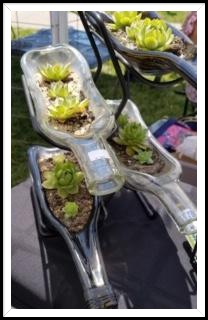 Rita Sherman's wine bottle succulent planters.