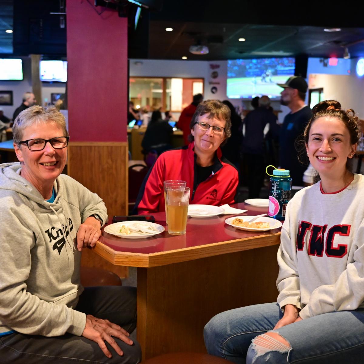 Three women at the Alumni Mixer