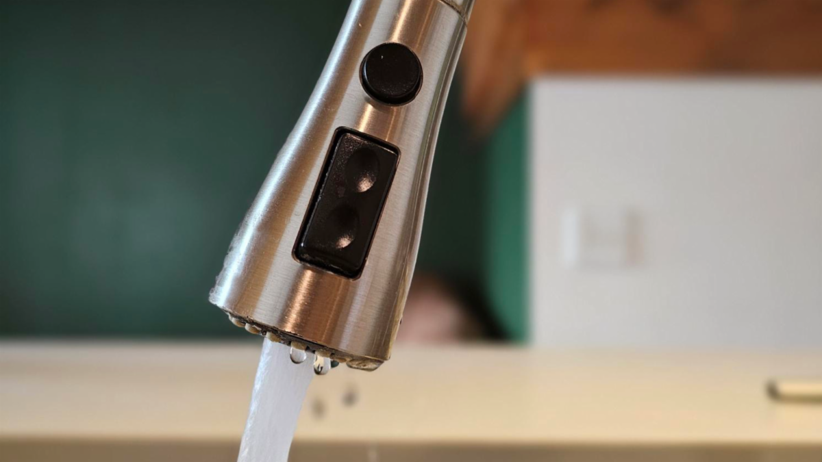 A water faucet running