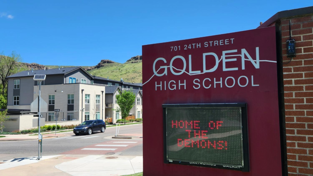 Exterior of Golden High School on a blue day
