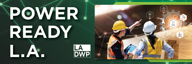 A man in a safety vest and hard hat holds a tablet while pointing to graphics overlaid on the image. A woman in a safety vest and hard hat stands beside him. White text on a green background says: Power Ready LA, with an LADWP logo below.
