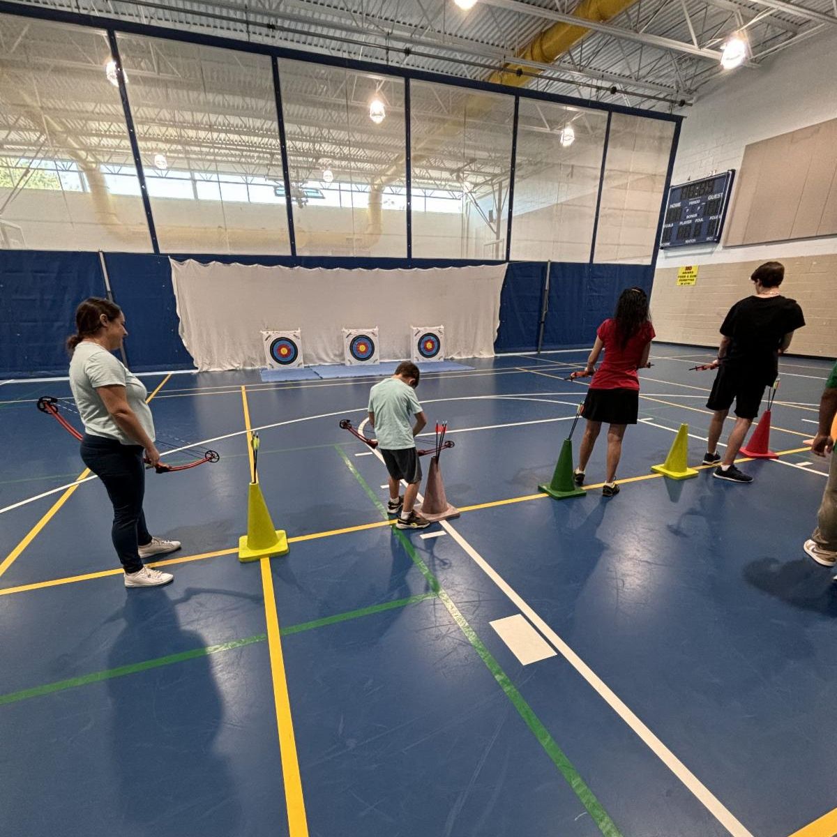 people doing archery