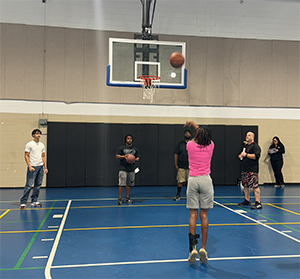girl playing basketball