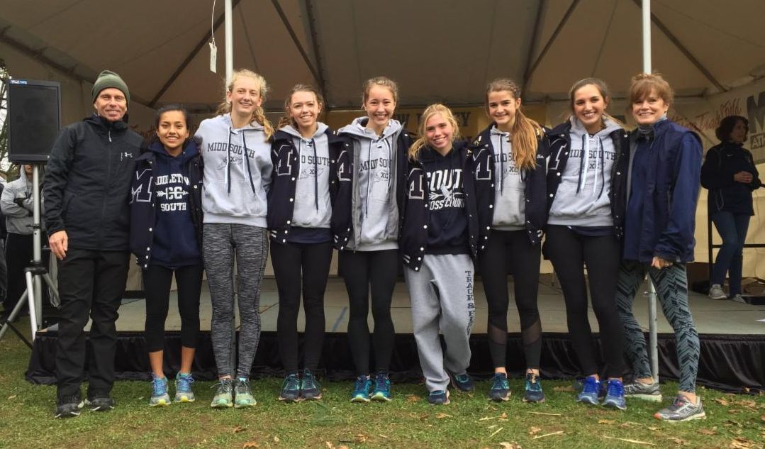 Coach William Clifton stands with his Cross Country runners at the 2018 Monmouth County Championship meet.