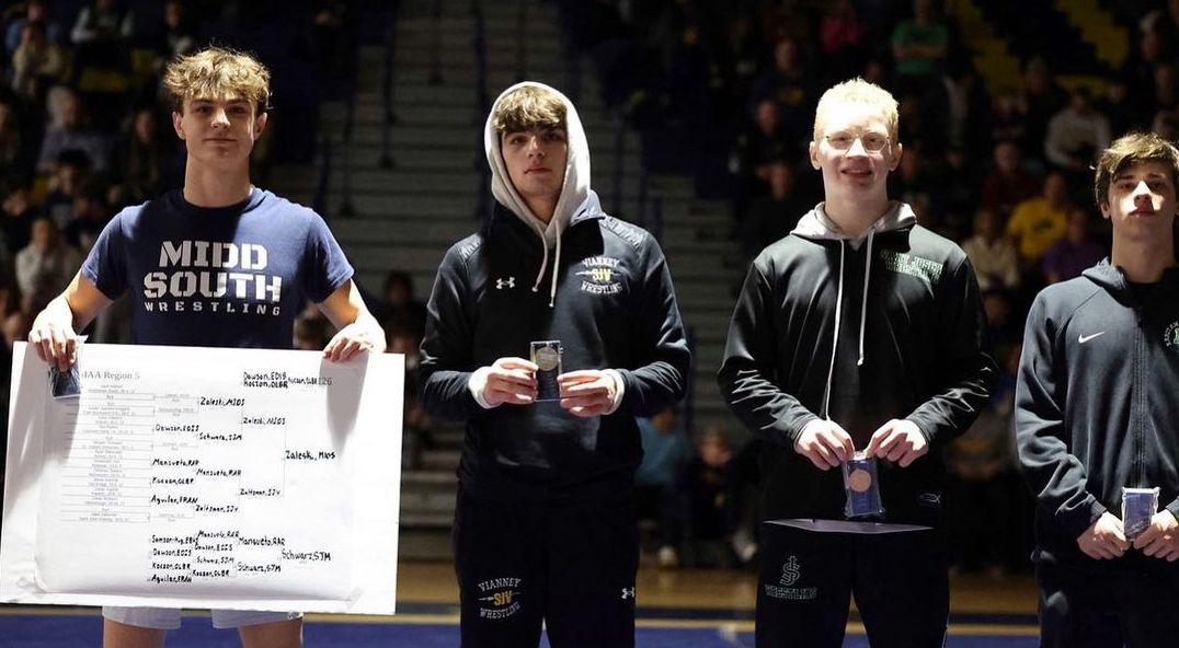 Jack Zaleski of High School South wins his third regional championship.