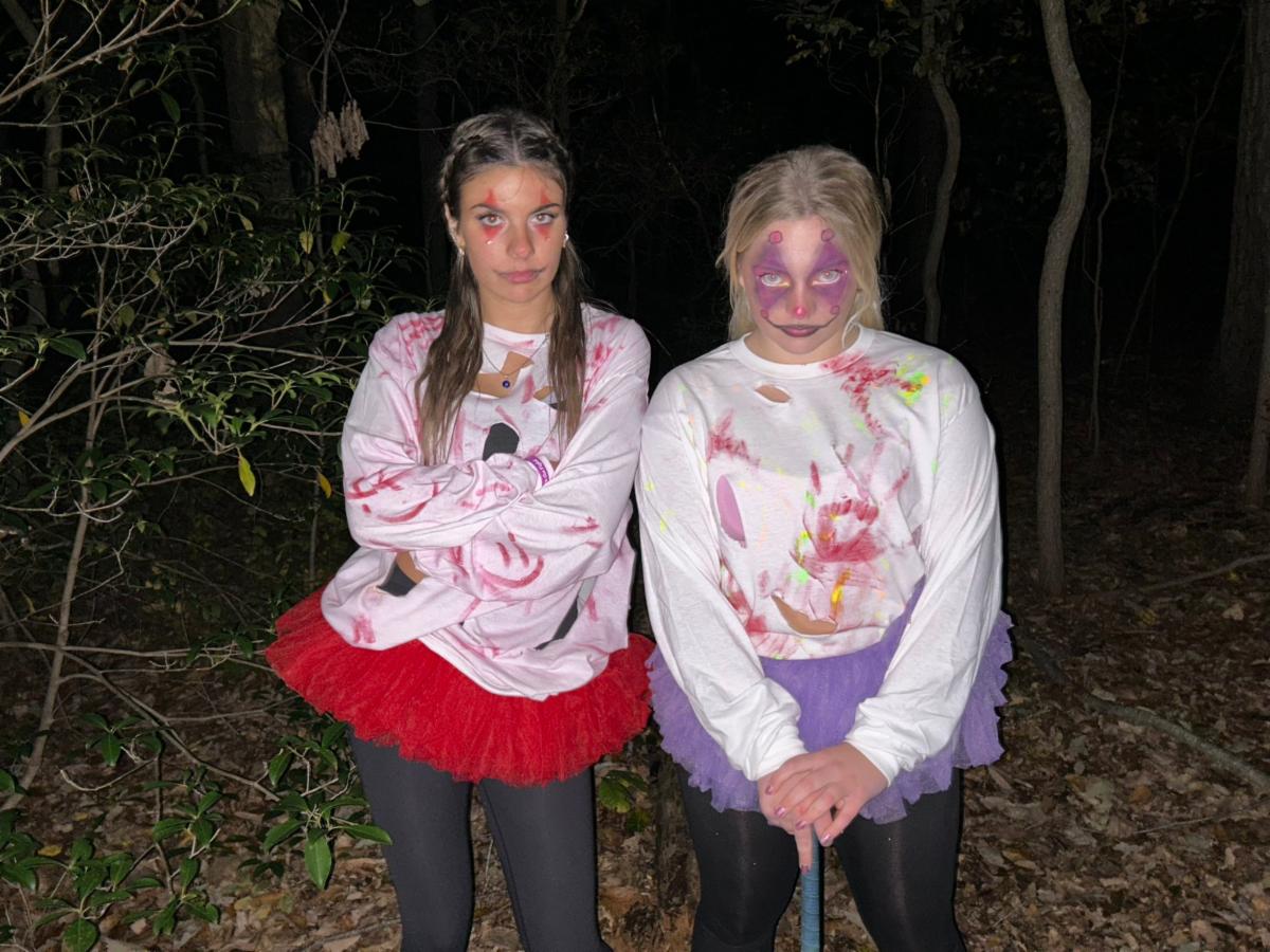 Students pose together in zombie costumes at the High School North Haunted Woods event.
