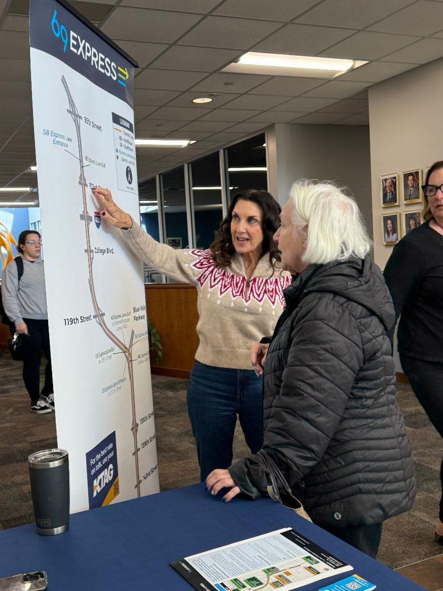 Project team members share 69Express information at Matt Ross Community Center at the Overland Park Farmers’ Market in November 2025.