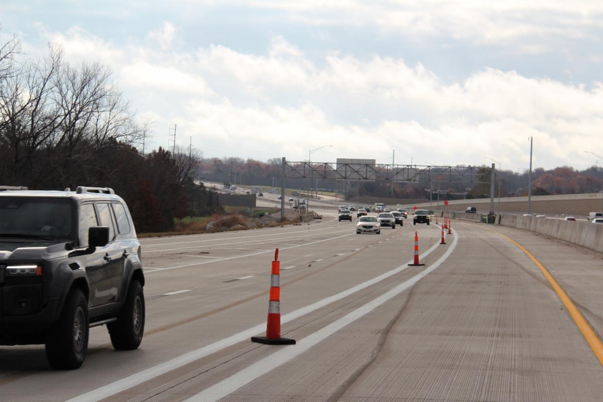 A picture from November 2025 of U.S. 69 near 119th Street showing the express lanes separated with cones.