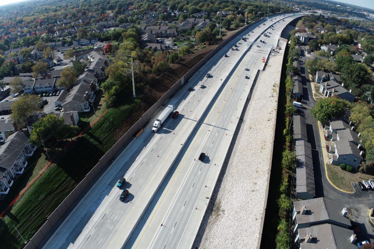 Completed noise walls flank the roadway along U.S. 69 near 119th Street. 