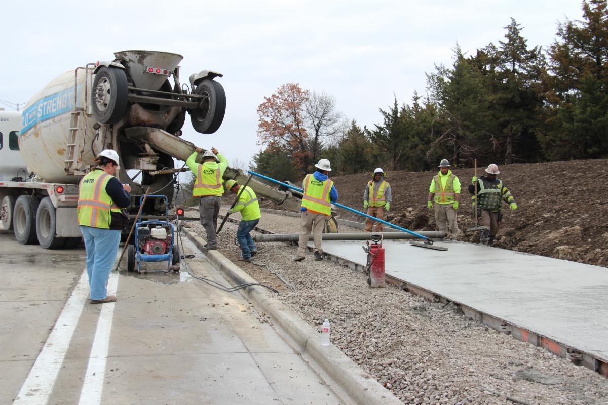 Concrete trail being poured at 167th Street in November 2025.
