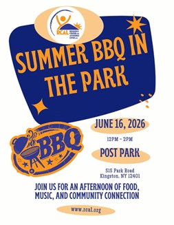 An event flyer with a white background featuring a large, dark blue shape at the top left that resembles a speech bubble. Inside the blue shape, bold orange text reads: "SUMMER BBQ IN THE PARK", accented by small orange sparkles. At the top of the blue shape sits the circular logo for the Resource Center for Accessible Living (RCAL). Below the main title, the flyer includes the following details: •	Graphic: To the left, there is an orange and blue oval graphic that features a grill illustration and reads "BBQ" in large letters. •	Date: June 16, 2026 •	Time: 12 PM - 2 PM •	Location: Post Park (515 Park Road, Kingston, NY 12401) •	Tagline: "JOIN US FOR AN AFTERNOON OF FOOD, MUSIC, AND COMMUNITY CONNECTION" •	Website: www.rcal.org