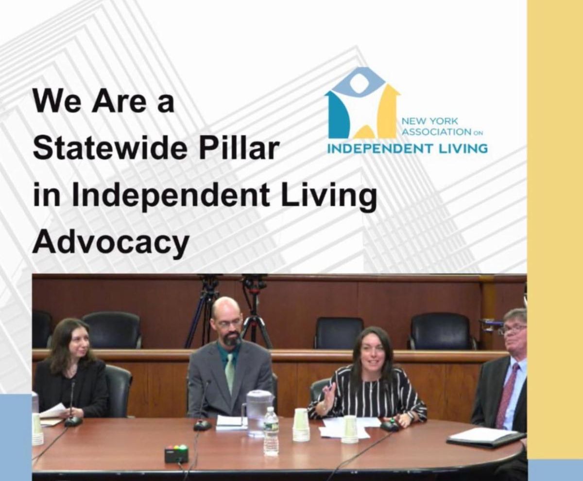 Graphic with image of Lindsay Miller, Executive Director of NYAIL testifying at the NYS Legislatures offices sitting at a large board room like table. Image heading says we are a Statewide Pillar in independent living advocacy. Image includes NYAIL Logo that says New York Association on Independent Living with the color theme of teal, sea blue, and golden yellow. The image and text is transposed on top a almost transparent city sky scraper. 