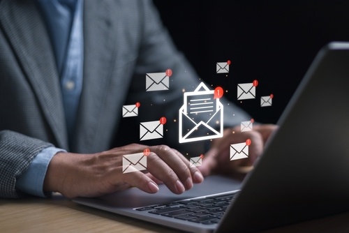 New email notification concept_ business email communication_ digital marketing _ businessman receives email notification on laptop computer_ internet technology.