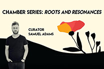 Sam Adams, curator, next to a stylized flower