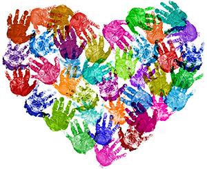 Heart made from colorful hands