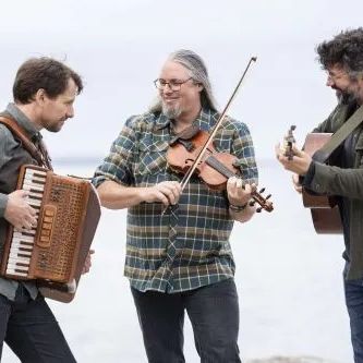 Three musicians playing together