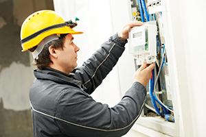 Man removing electric meter