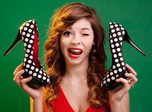 Woman with shoes winking