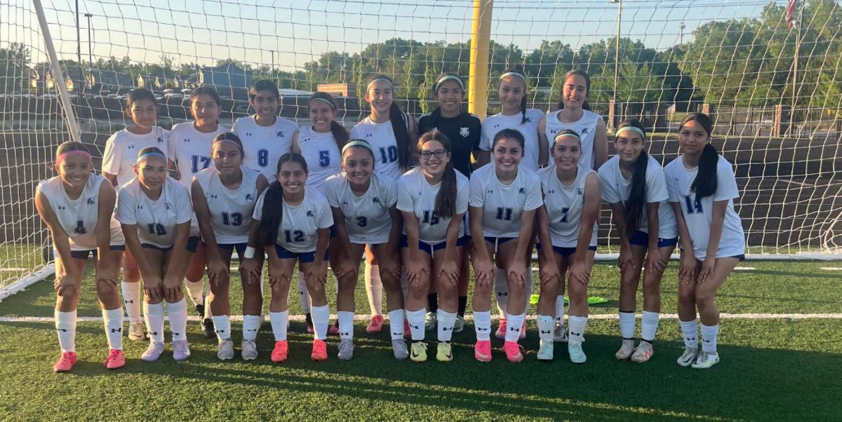 The Sumner Academy Girls soccer team poses for a photo