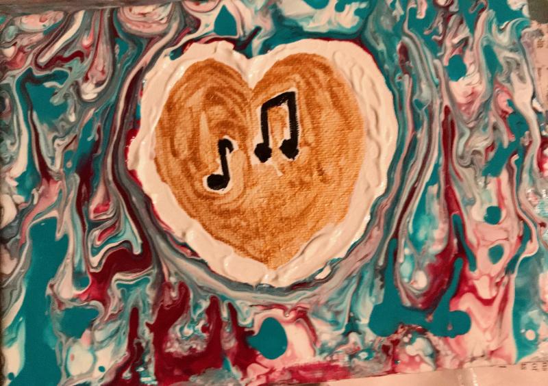 Painting with musical notes in gold heart