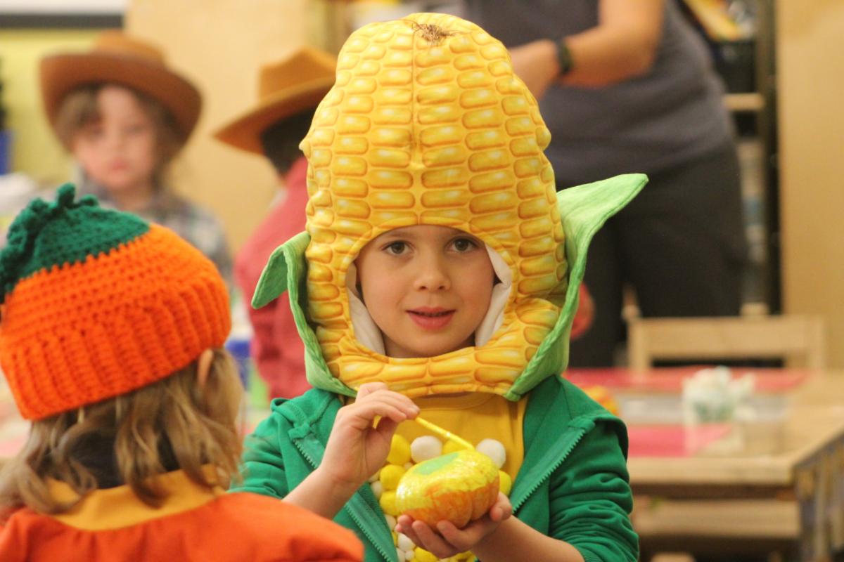 Kindergartener dressed up as corn to celebrate farm curriculum day
