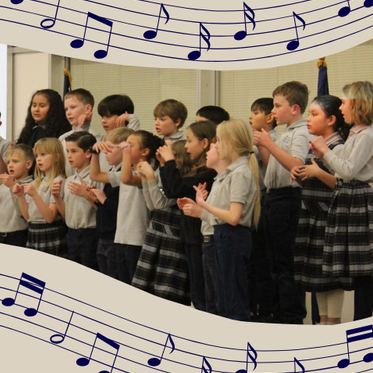 Lower school students singing in a choir