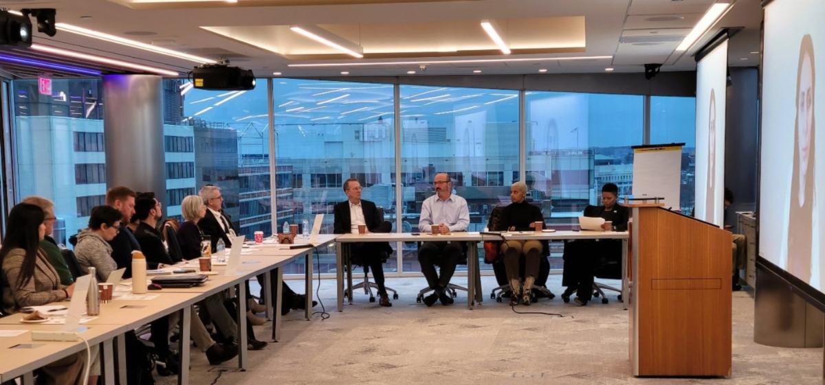 Smart Growth Network Quarterly Discussion participants seated around a a circular table