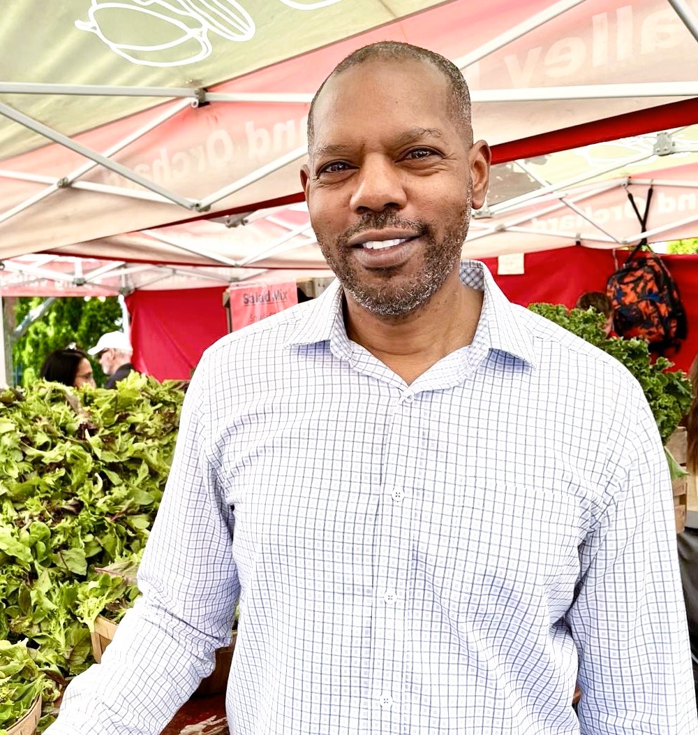 Nigel Fields, Director of the Office of Community Revitalization, at a local farmers market