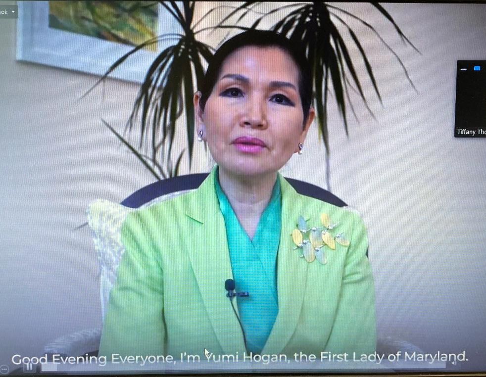 First Lady Yumi Hogan gives remarks to open art show via Zoom.  
