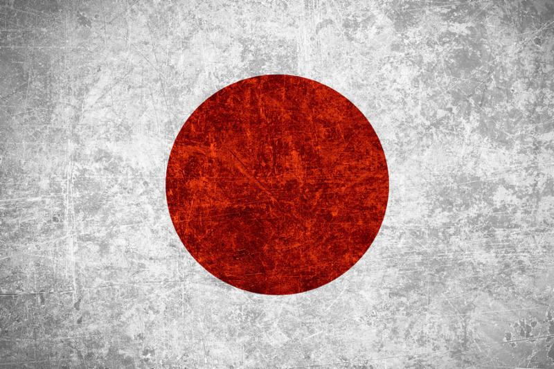flag of Japan or Japanese banner on scratched vintage texture