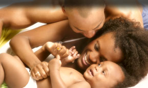 family-cuddling-baby.jpg