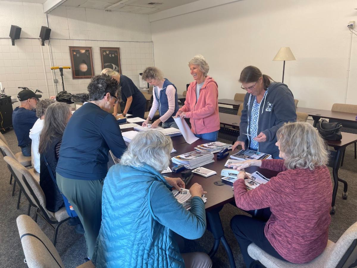 OLLI Membership Team assembling catalog mailings