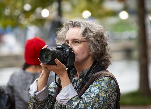 an older woman with a camera