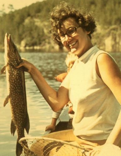 Donna Murrill holding up a fish