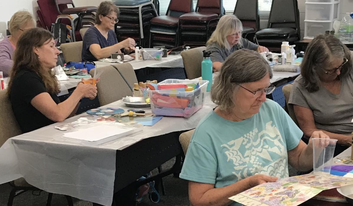 OLLI members making collages