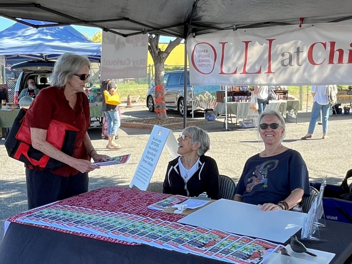 Leslie Howard Margaret Rader and Lynda Klein at the Farmers' Market booth