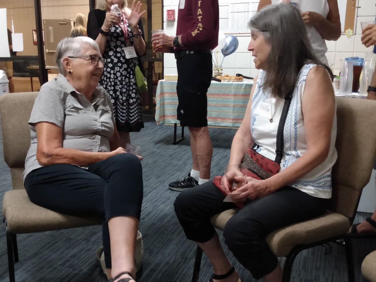 Sandra Flake and Willa Walker chatting
