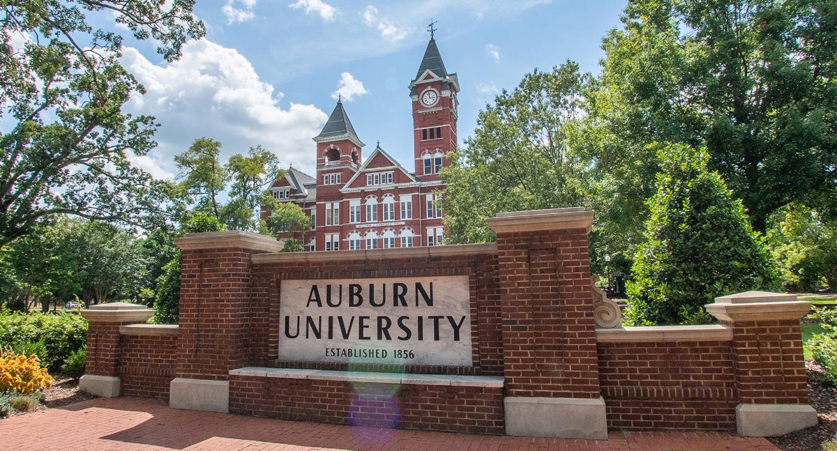 Auburn University sign with Samford Hall in background
